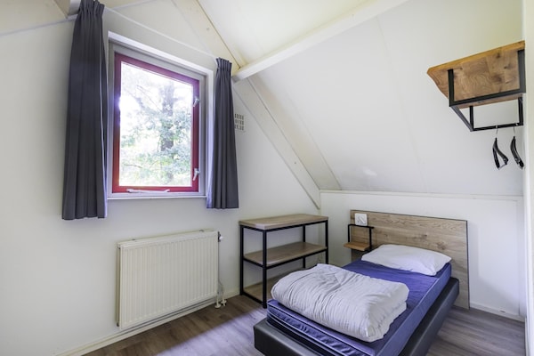 Foto van Saunabungalow aan het meer voor 4 - Vakantiehuis in Ewijk - BedRoom