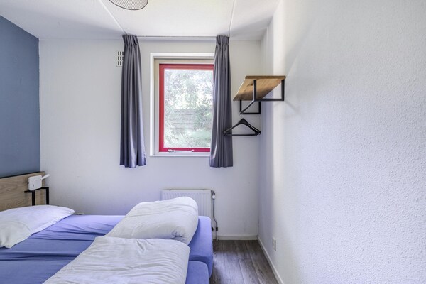 Foto van Saunabungalow aan het meer voor 4 - Vakantiehuis in Ewijk - BedRoom