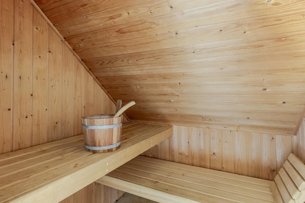 Foto van Saunabungalow aan het meer voor 4 - Vakantiehuis in Ewijk - Sauna