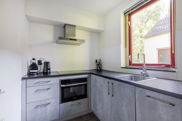 Foto van Saunabungalow aan het meer voor 4 - Vakantiehuis in Ewijk - Kitchen