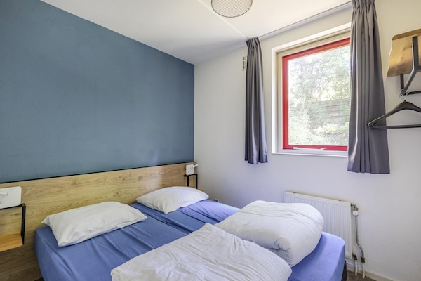Foto van Saunabungalow aan het meer voor 4 - Vakantiehuis in Ewijk - BedRoom