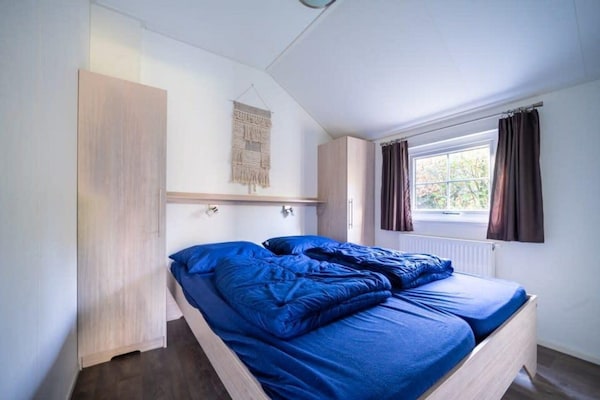 Foto van Chalet met afwasmachine, bij Park De Veluwe - Vakantiehuis in Otterlo - BathRoom