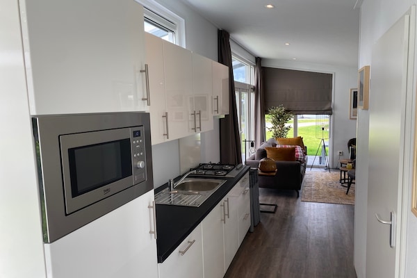 Foto van Chalet in Gelderland met ruime tuin - Vakantiehuis in Lathum - Kitchen