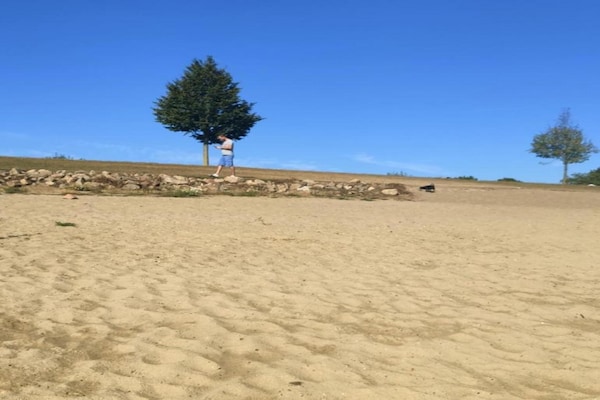 Foto van Chalet in Gelderland met ruime tuin - Vakantiehuis in Lathum - AreaSummer20KM