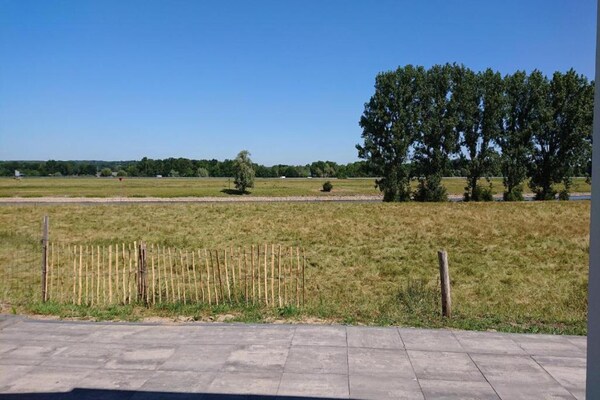 Foto van Chalet in Gelderland met ruime tuin - Vakantiehuis in Lathum - AreaSummer20KM