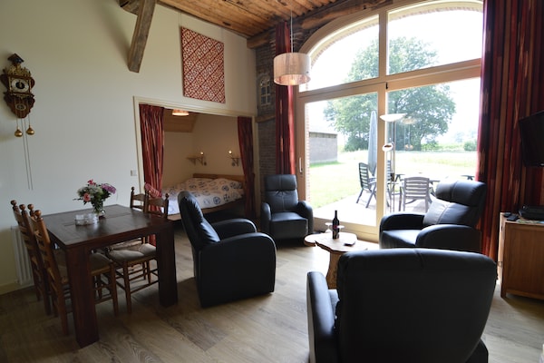 Foto van Boerderij bij Golfbaan Geesteren - Vakantiehuis in Geesteren - LivingRoom