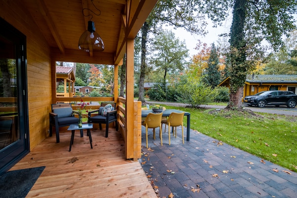 Foto van Vakantiehuis in Markelo bij bos en zwembad - Vakantiehuis in Markelo - TerraceBalcony