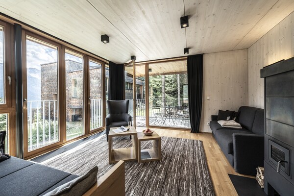 Foto van Chalet Resort am Großglockner met infraroodcabine - LivingRoom