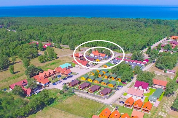 Foto van Comfortabel chalet in Gleznowo met open haard - Vakantiehuis in Bobolin - AreaSummer20KM