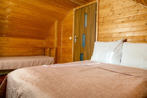 Foto van Comfortabele huizen met een spa-zone - Vakantiehuis in Wrzosowo - BedRoom