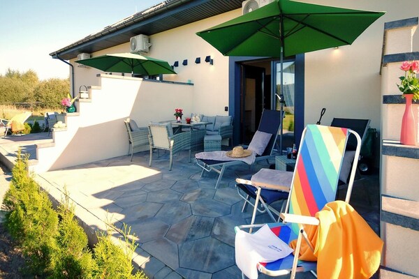 Foto van Vakantiehuis in Mielenko bij Strand - Vakantiehuis in Mielenko - TerraceBalcony