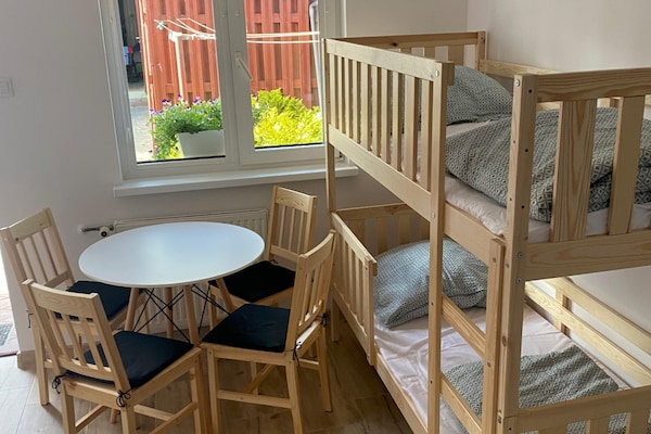 Foto van 4-persoonskamer met kitchenette, Sarbinowo - Vakantiehuis in Sarbinowo - DiningRoom