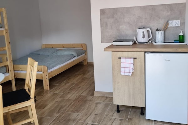 Foto van 4-persoonskamer met kitchenette, Sarbinowo - Vakantiehuis in Sarbinowo - BedRoom