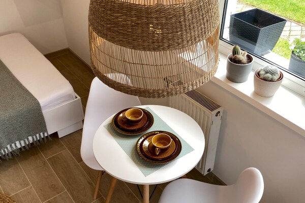 Foto van Appartement voor 3 personen vlakbij de zee - Vakantiehuis in Sarbinowo - DiningRoom