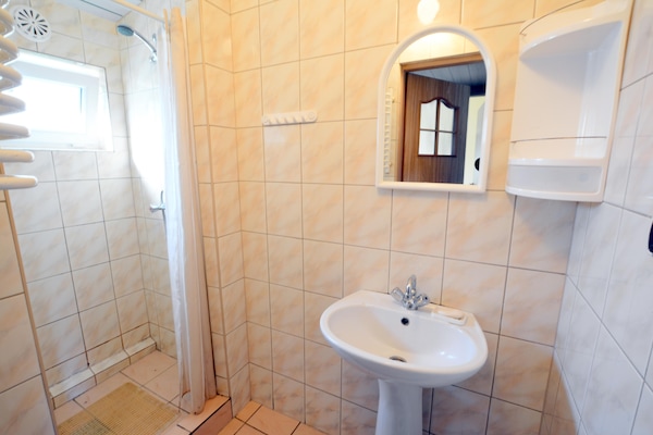 Foto van Huisje bij Rosnowskie Meer met Strand - Vakantiehuis in Rosnowo - BathRoom