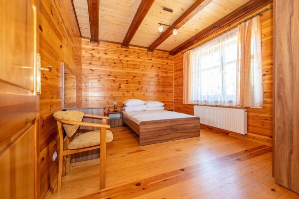 Foto van Comfortabel vakantiehuis met open haard en terras - Vakantiehuis in Bobolin - BedRoom