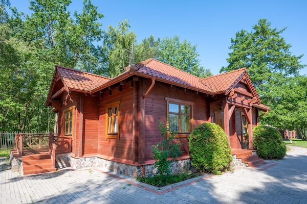Foto van Comfortabel vakantiehuis met open haard en terras - Vakantiehuis in Bobolin - ExteriorSummer