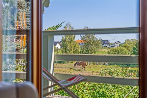 Foto van Comfortabel vakantiehuis met open haard, Bobolin - Vakantiehuis in Bobolin - ViewSummer