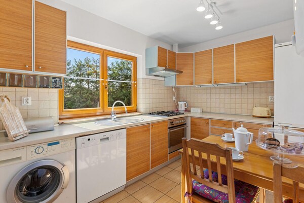 Foto van Comfortabel vakantiehuis met open haard, Bobolin - Vakantiehuis in Bobolin - Kitchen