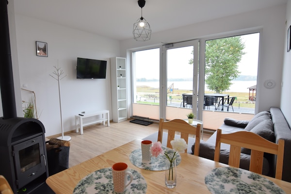 Foto van Huisje aan Kiedrowickie Meer met Roeiboot - Vakantiehuis in Kiedrowice - LivingRoom