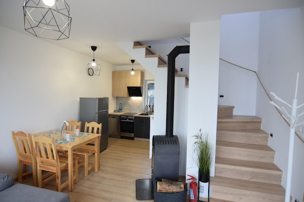 Foto van Huisje aan Kiedrowickie Meer met Roeiboot - Vakantiehuis in Kiedrowice - LivingRoom