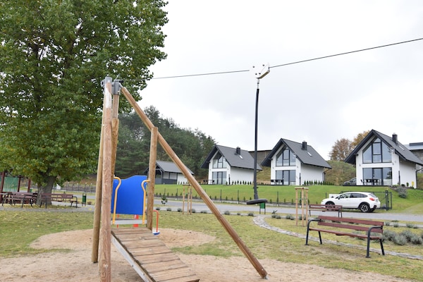 Foto van Huisje aan Kiedrowickie Meer met Roeiboot - Vakantiehuis in Kiedrowice - AreaSummer1KM