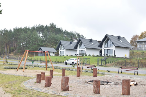 Foto van Huisje aan Kiedrowickie Meer met Roeiboot - Vakantiehuis in Kiedrowice - AreaSummer1KM