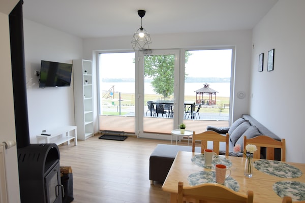 Foto van Huisje aan Kiedrowickie Meer met Roeiboot - Vakantiehuis in Kiedrowice - ViewWinter