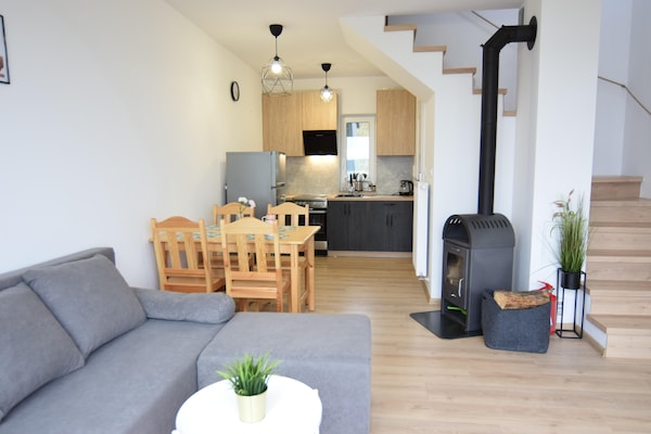 Foto van Huisje aan Kiedrowickie Meer met Roeiboot - Vakantiehuis in Kiedrowice - LivingRoom