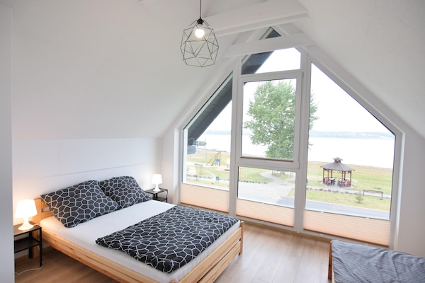 Foto van Huisje aan Kiedrowickie Meer met Roeiboot - Vakantiehuis in Kiedrowice - BedRoom