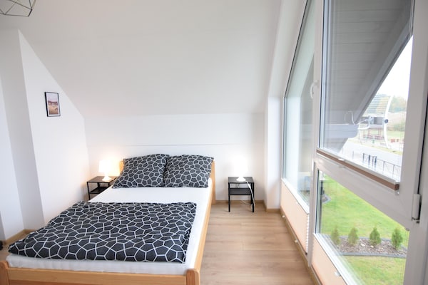 Foto van Huisje aan Kiedrowickie Meer met Roeiboot - Vakantiehuis in Kiedrowice - BedRoom