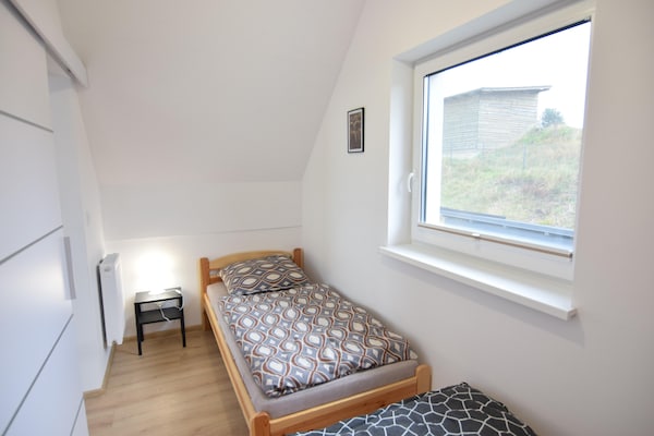 Foto van Huisje aan Kiedrowickie Meer met Roeiboot - Vakantiehuis in Kiedrowice - BedRoom