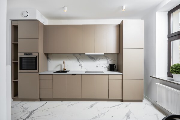 Foto van Appartement vlakbij Piotrkowska Street - Vakantiehuis in Łódź - Kitchen