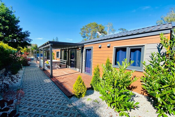 Foto van Bungalow in Dziwnów bij Oostzee Promenade - Vakantiehuis in Dziwnow - ExteriorSummer