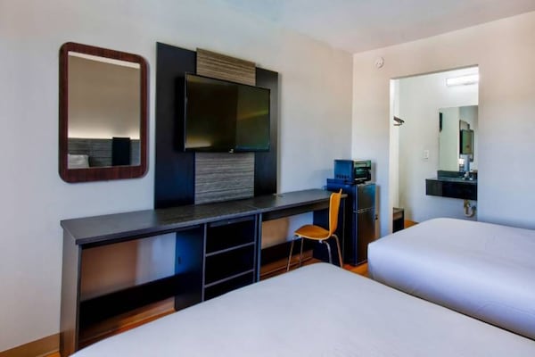 Foto van 2 tweepersoonsbedden | Rookvrij - Vakantiehuis in Gainesville - BedRoom