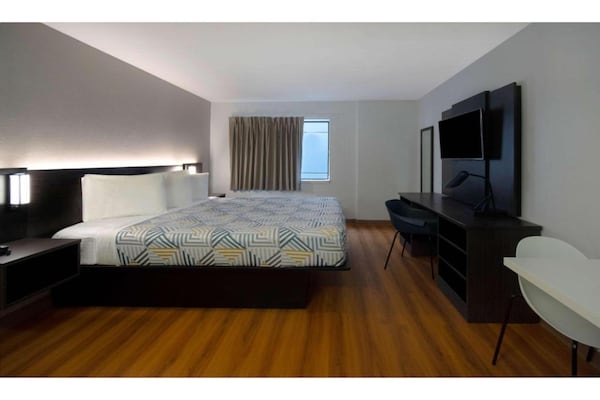 Foto van 1 kingsize bed | Rookvrij - Vakantiehuis in MERRILLVILLE - BedRoom