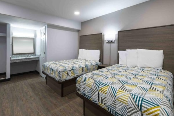 Foto van 2 tweepersoonsbedden | Suite, rookvrij, keuken - Vakantiehuis in Hickory - BedRoom