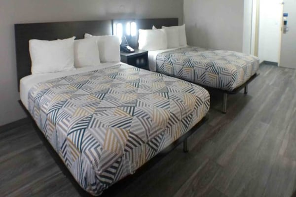 Foto van 2 tweepersoonsbedden (queensize) | Rookvrij - Vakantiehuis in Winslow - BedRoom