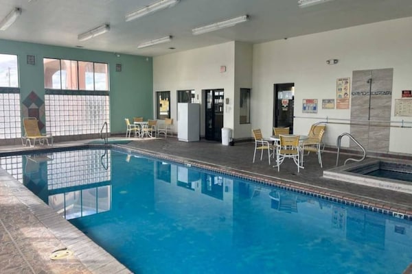 Foto van 1 kingsize bed | Rookvrij, koelkast - Vakantiehuis in Deming NM - Pool