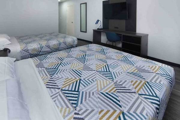 Foto van 2 tweepersoonsbedden (queensize) - Vakantiehuis in Fort Worth TX - BedRoom