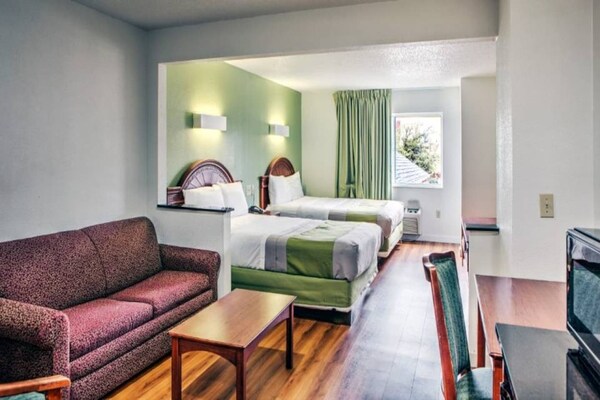 Foto van 2 tweepersoonsbedden | Suite, Nsmk, slaapbank - Vakantiehuis in Dallas - BedRoom