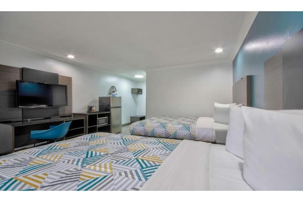 Foto van 2 tweepersoonsbedden (queensize) | (Micfridge) - Vakantiehuis in San Bernardino - BedRoom