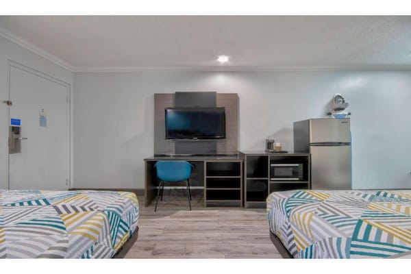 Foto van 2 tweepersoonsbedden (queensize) | (Micfridge) - Vakantiehuis in San Bernardino - BedRoom