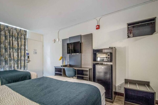 Foto van 2 tweepersoonsbedden | Rookvrij, Keuken - Vakantiehuis in Groves - Facilities