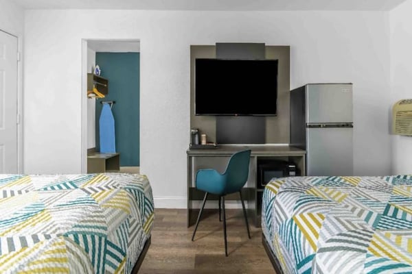 Foto van 2 tweepersoonsbedden | Nsmk, koelkast - Vakantiehuis in Madera CA - BedRoom