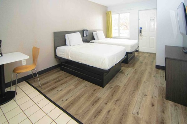 Foto van 2 queensize bedden Nmsk | Palm Beach - Vakantiehuis in West Palm Beach - BedRoom