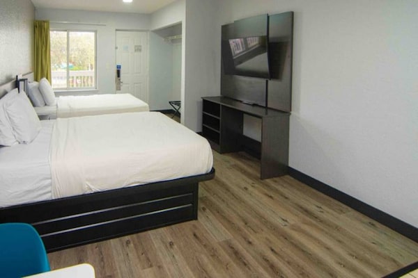 Foto van 2 queensize bedden Nmsk | Palm Beach - Vakantiehuis in West Palm Beach - BedRoom