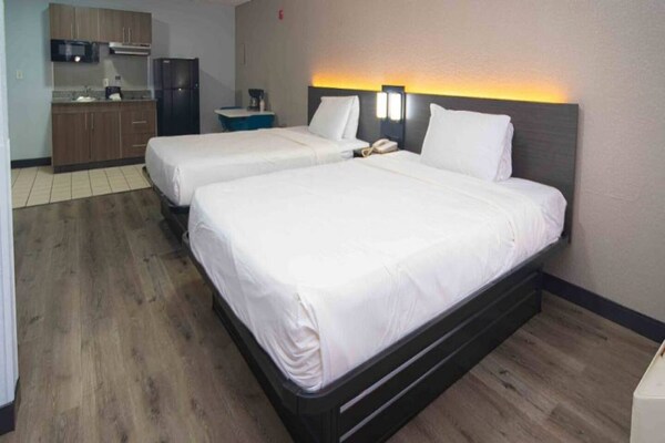 Foto van 2 queensize bedden Nmsk | Palm Beach - Vakantiehuis in West Palm Beach - BedRoom