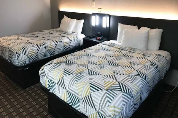 Foto van 2 tweepersoonsbedden | Roken toegestaan, koelkast - Vakantiehuis in Tupelo - BedRoom