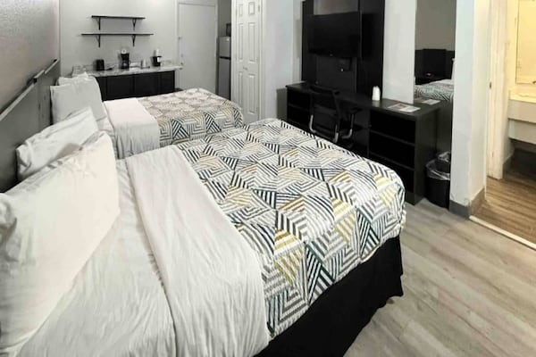 Foto van 2 tweepersoonsbedden | Rookvrij, Keuken - Vakantiehuis in Phoenix - Facilities